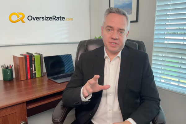 Freight forwarder using OversizeRate.com to calculate heavy haul and oversize transportation rates for heavy equipment shipping.